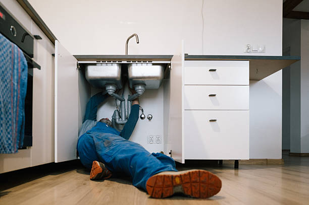 Professional Drain Cleaning technician working in Buckner, MO